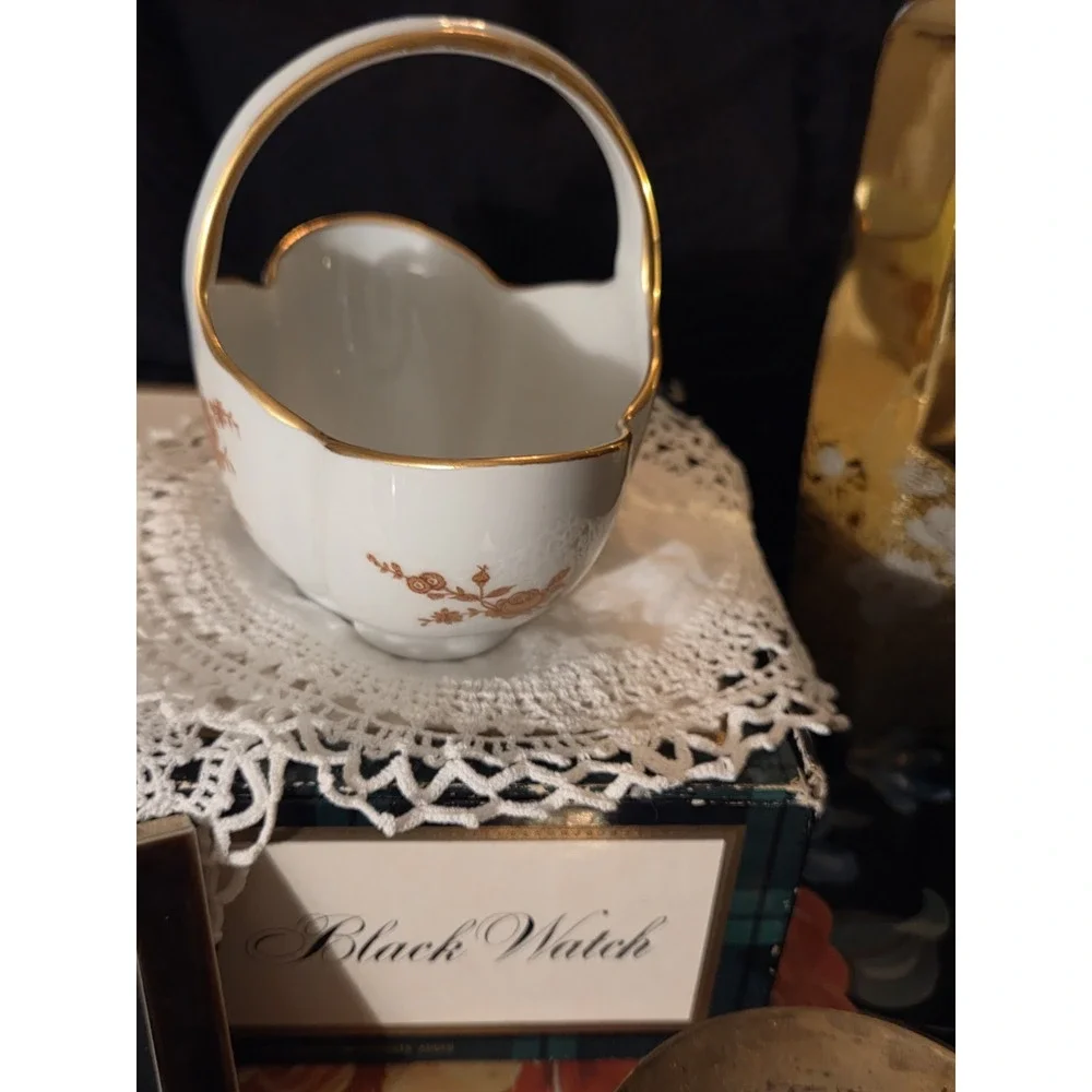 vintage Limoges, France, porcelain compote basket featuring a tall arched...